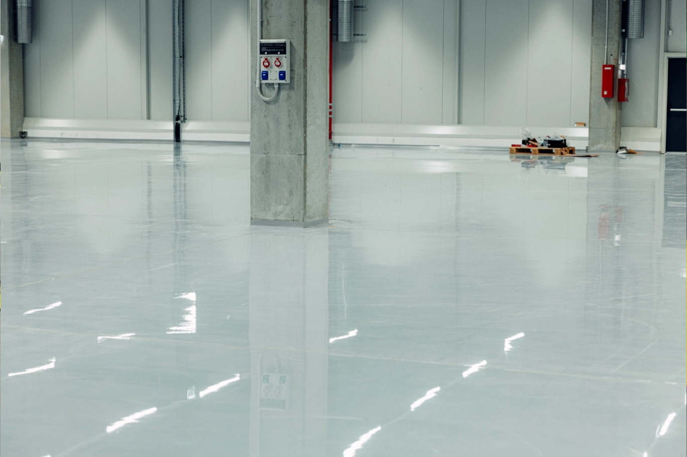 Shiny, polished warehouse floor.